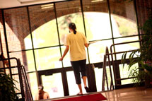 student leaving the College of Education building on the MSU Billings main campus