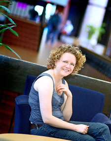 student in the LA building near the library entrance