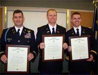 New Lieutenants Brodie Moberly, Chris Lindgren, and Travis Light at their Commissioning Ceremony, marking the completion of their ROTC training.