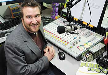 photo of an MSUB student interning with a radio station