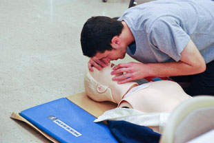 a student practicing CPR