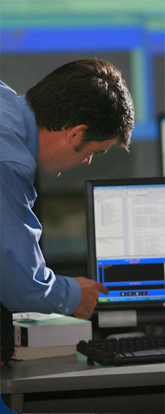 photo of faculty member at computer