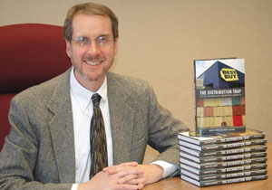 Professor Tim Wilkinson with his new book
