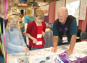 NASA scientist teaches science principles to girls at Chicks in Science event