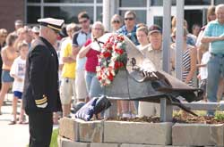 A wreath is placed on the 911 Memorial at City College