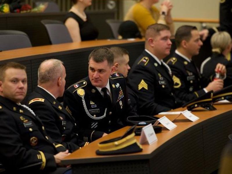 Soldiers sitting during the commissioning ceremony