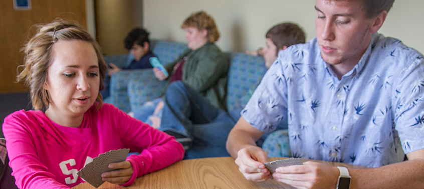 Students playing cards