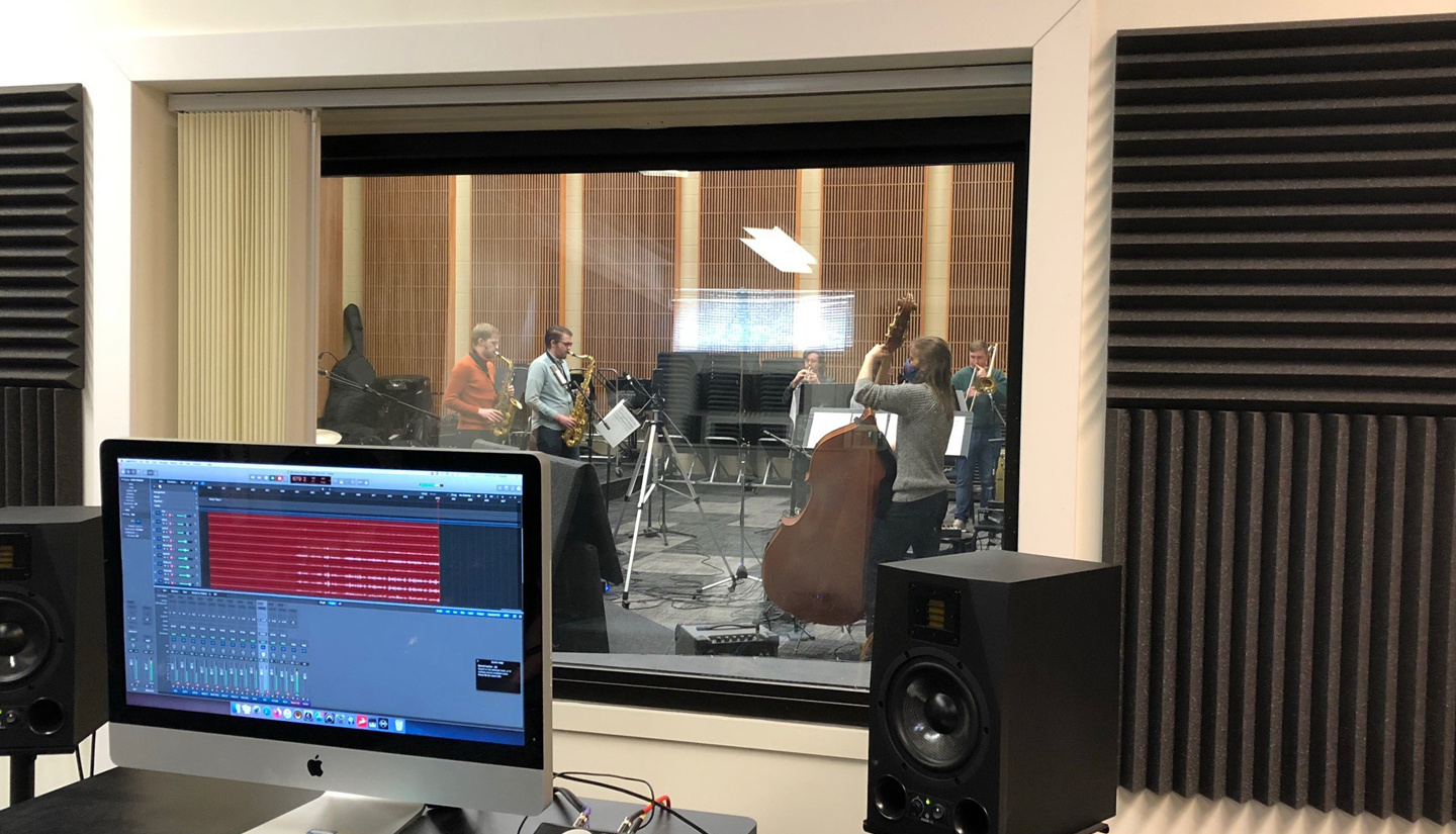 a view of the jazz combo from the recording studio