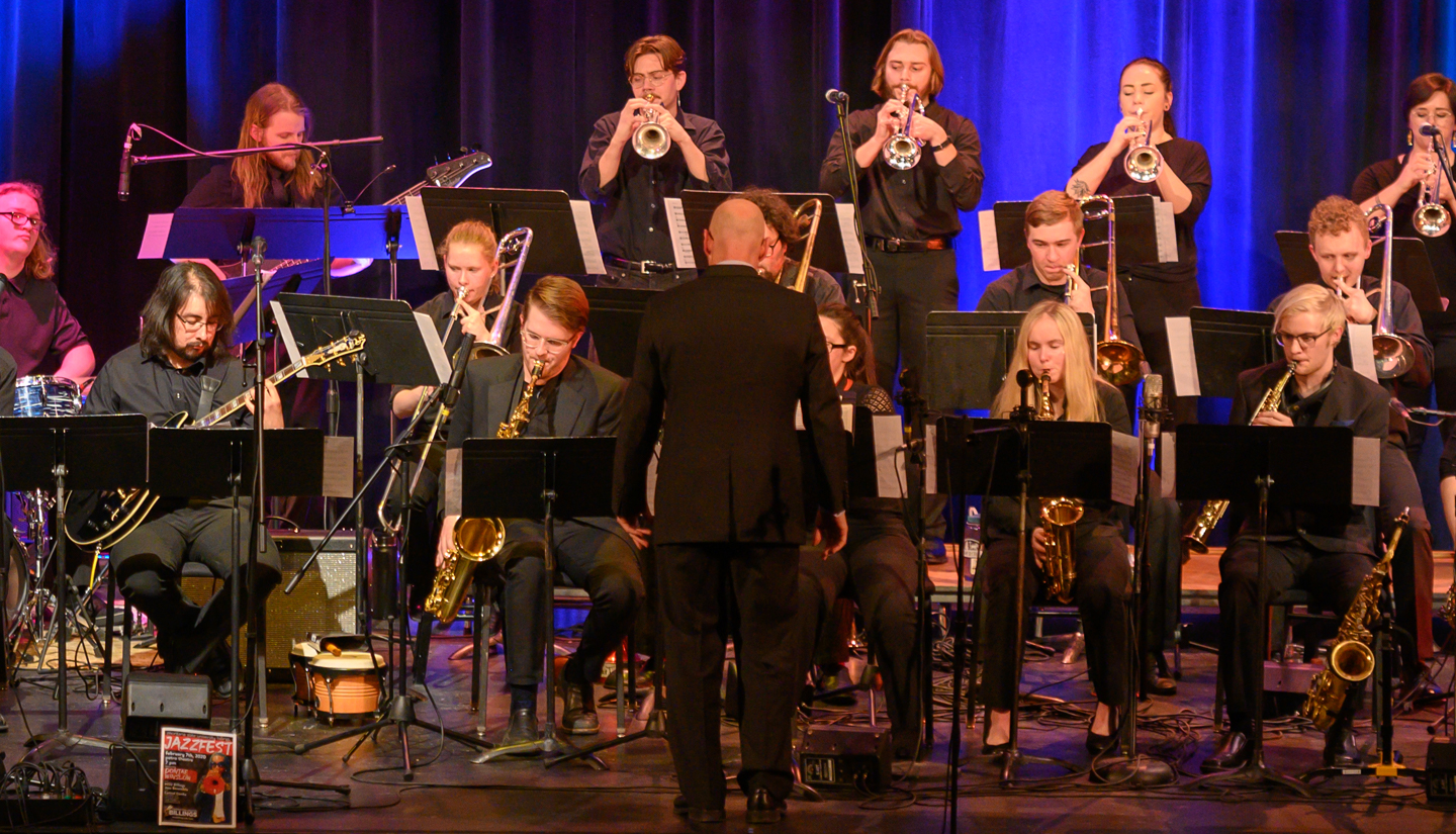 Roberts directing the jazz ensemble at a recent jazz festival