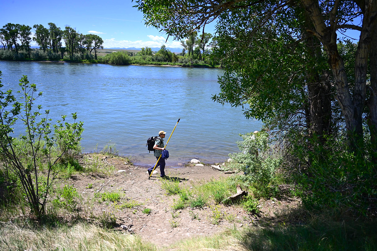 Michael Cuddy on Yellowstone River with equipment