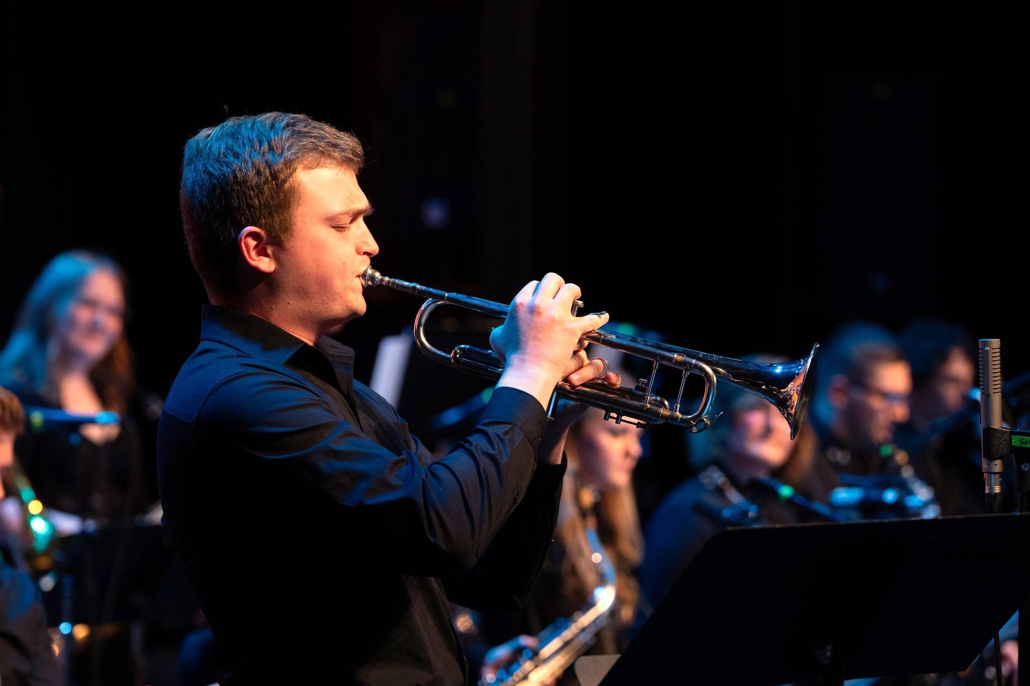 MSUB Jazz Orchestra performing at the 2025 Jazz Festival with Elijah Sneigoski improvising.