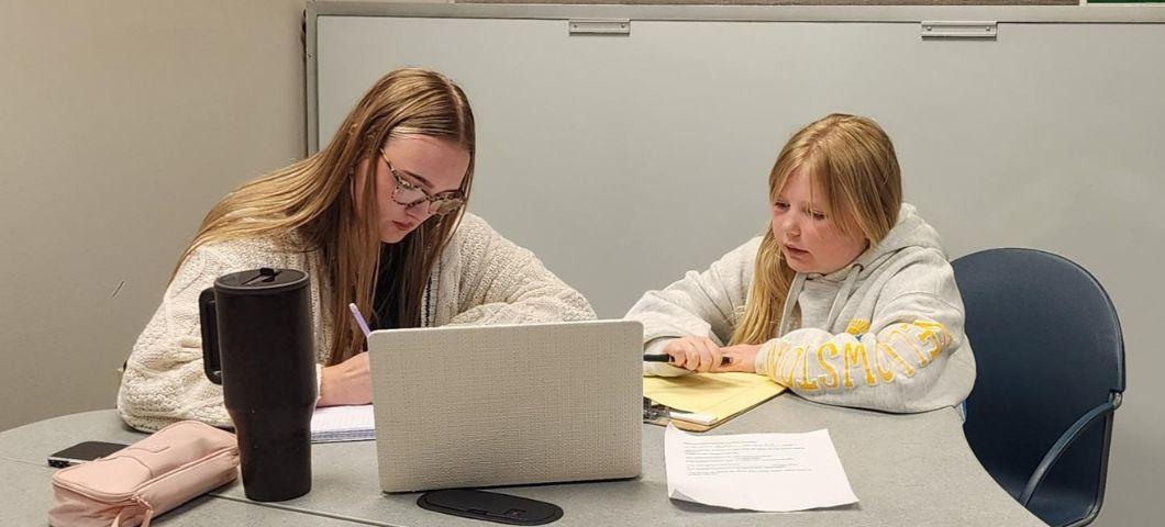 COE Student works one-on-one with a child