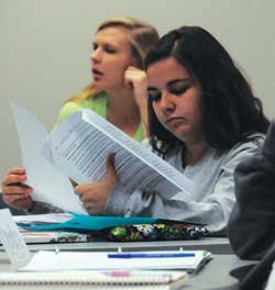 a student reviews her notes in a College of Education class on the MSUB University campus
