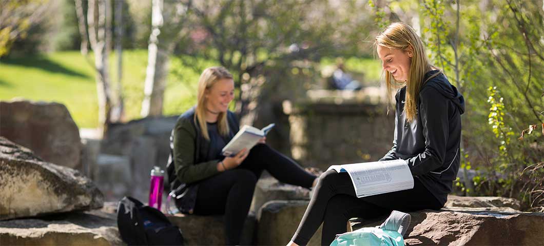 students doing homework in Peaks to Plains Park