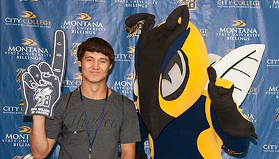 Student with Buzz the Mascot