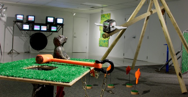 closeup of a prairie dog sculpture in conjunction with other isntallations