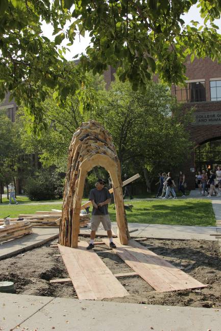Foon Sham insatlling "Ghost Cave" on MSUB's campus