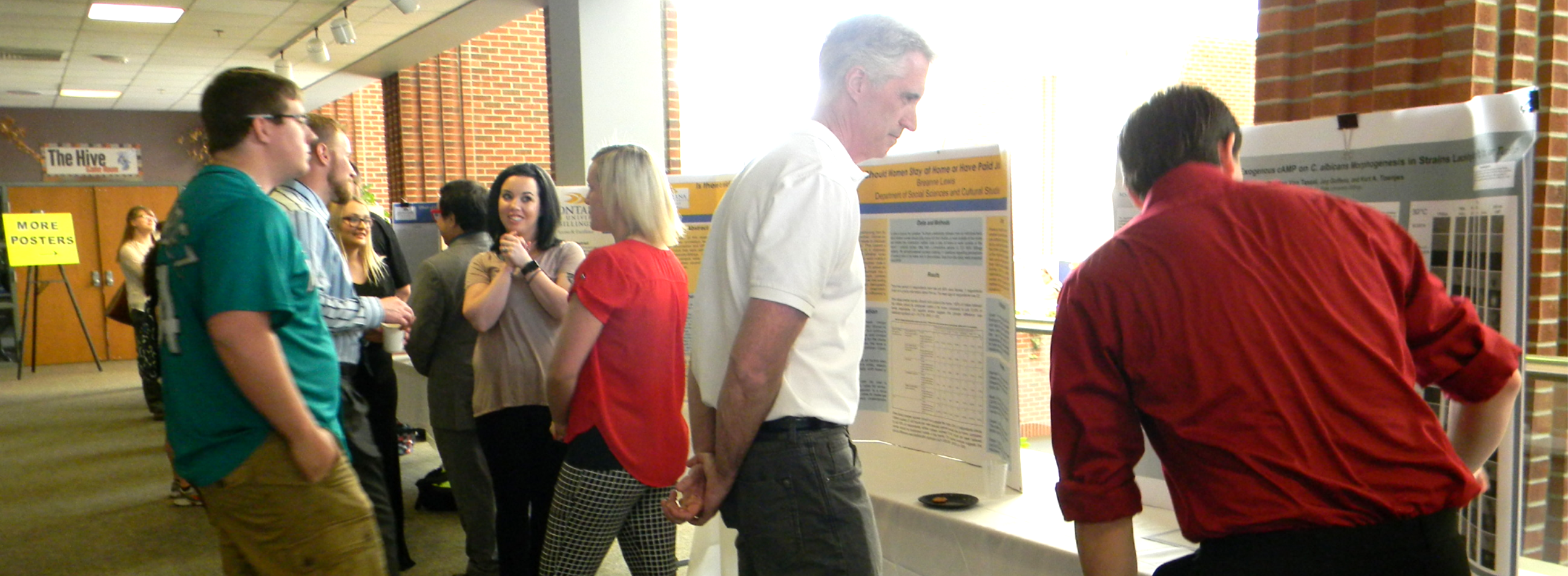 students and community members gathered to discuss research projects