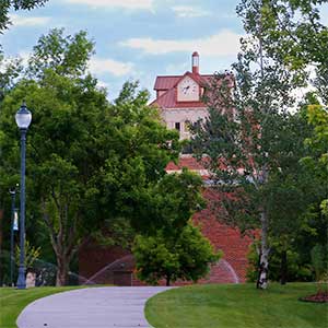 a photo of McMullen Hall taken from the west in summertime