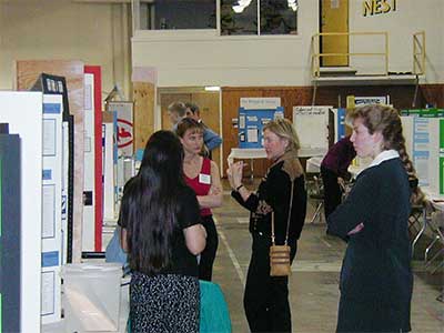 judges talk with a students