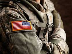 an American flag on the sleeve of a veteran