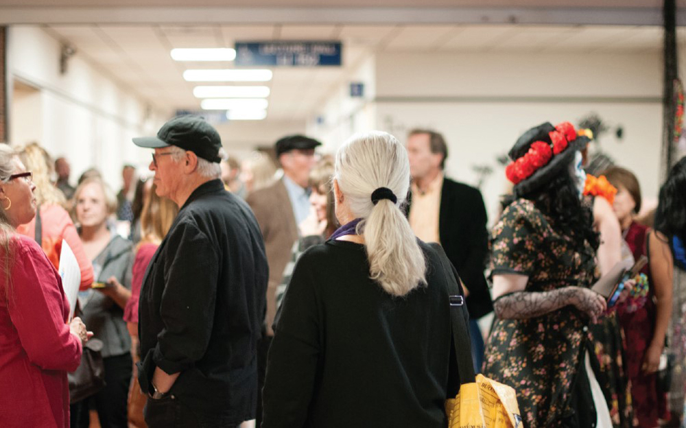 people milling around in a hallway