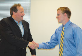 Rob Barnosky shakes hands with Governor Brian Schweitzer