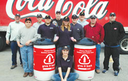 Recycling crew with Coca Cola employees