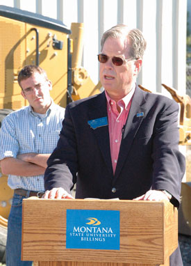 Chancellor Rolf Groseth speaks at the ground-breaking ceremony for the wind turbine