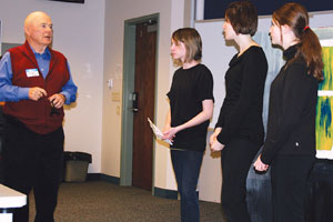 Judge and students at National History Day competition