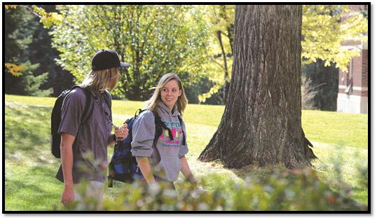 photo of students walking across the main MSUB campus