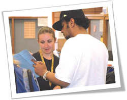 an advisor helps a returning student