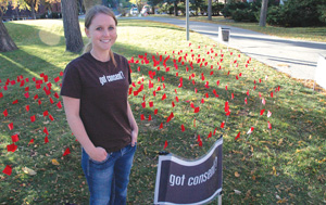 Crystal Svoboda with red flags on the MSUB campus