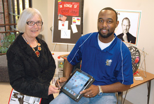 Dr. Connie Landis and Darrell Williams with display items
