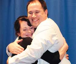 nursing students share hugs