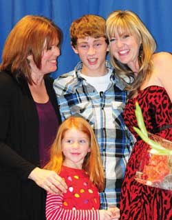 family celebrates nurse's pinning