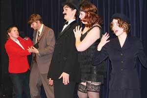students rehearsing The 39 Steps