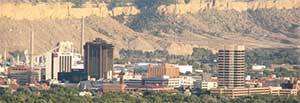 photo of part of downtown Billings, including a refinery