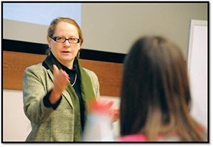 a faculty member with a student at MSUB