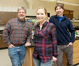 Dr. Kurt Toenjes (left) and Dr. David Butler (right) pose with biology student Elizabeth Mullins