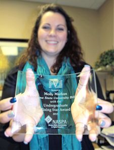 Kelli Grantham, left, and Molly Markus discuss business at the Housing and Residential Services Office on the MSUB campus.