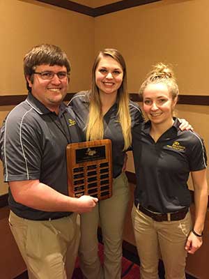 Champs with their award