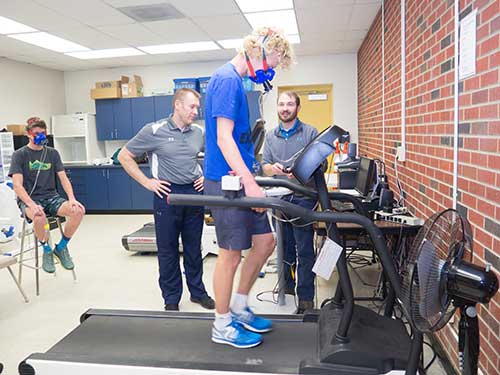 students and professors in the VO2 lab