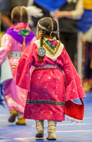 young Powwow dancers in full regalia