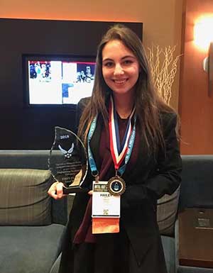 Hailey with her awards