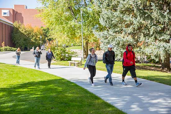 students walking on the MSU Billings university campus in Fall