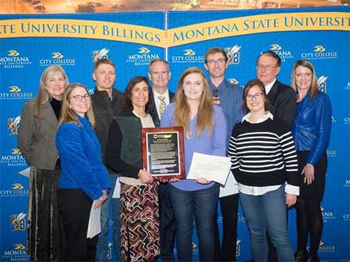 MSUB students and faculty with award plaque