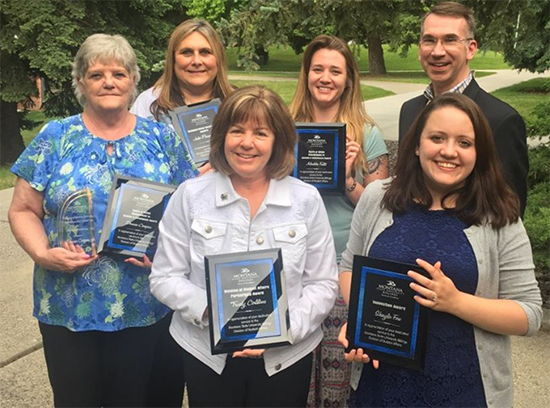 Dr. Oravecz with award-winning staff members